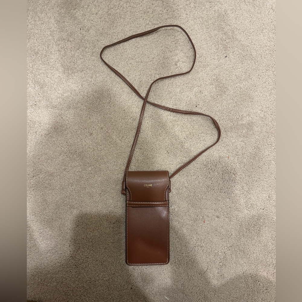 Celine cell phone holder.
